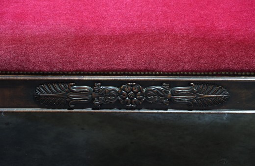 antique couch with carving