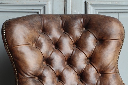 antique armchair in leather