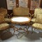 gilded LXV salon suite with élégant center table
