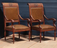 antique oak and leather armchairs