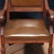 antique oak and leather armchairs