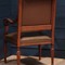 antique oak and leather armchairs