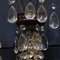 Pair brass and crystal sconces