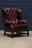 Winged leather chesterfield library chair