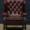 Winged leather chesterfield library chair