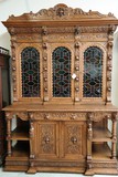 antique carved wood and leaded glass buffet