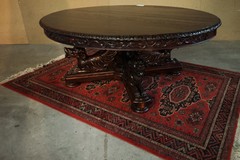 antique hunting style table with carved legs