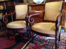 pair of antique mahogany armchairs