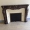 Antique fireplace in the style of Louis XV