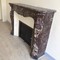 Antique fireplace in the style of Louis XV