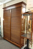 Storage cabinet with tambour door