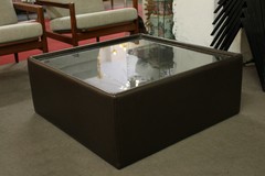 Leather and glass coffee table 70