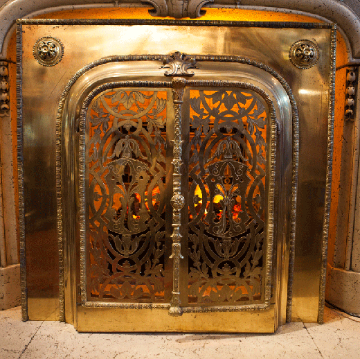 old bronze fireplace insert