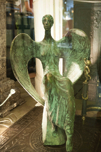 bronze sculpture of guarding angel