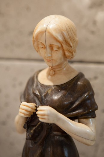 old figurine of young woman bronze and ivory