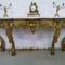 A gilt consoltable with marble top 