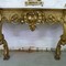 A gilt consoltable with marble top 