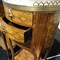 A pair of nightstands with marble top