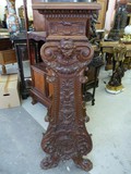 A carved stand