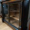 A glass side cabinet