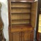 A 19thC.mahogany topsecretaire with mirror doors