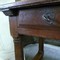 An antique Spanish table in chestnut with 3 drawers