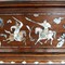 A hardwood and mother-of-pearl cabinet 