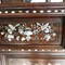 A hardwood and mother-of-pearl cabinet 