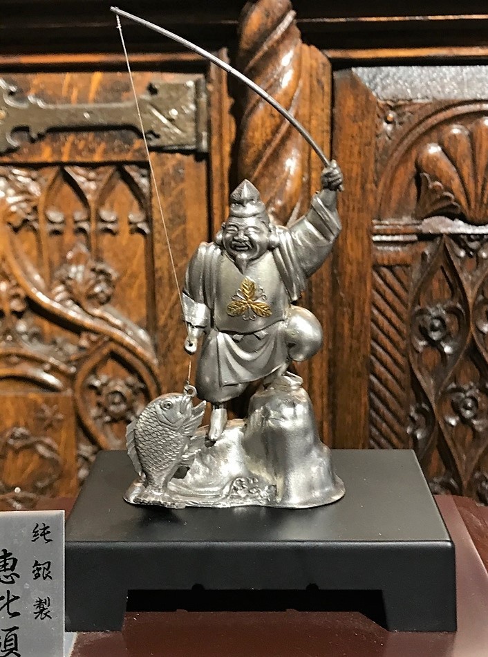 Antique sculpture "God Ebisu with fish"