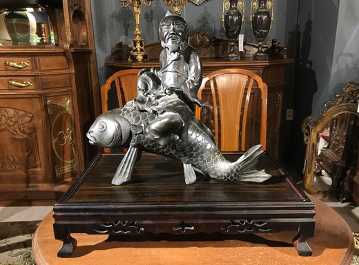 Antique sculpture "Kinko Sennin on a Fish"