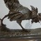 Bronze sculpture of a rooster