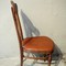 wooden chair with leather seat