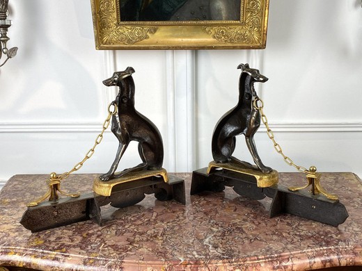 Antique fireplace andirons with greyhounds