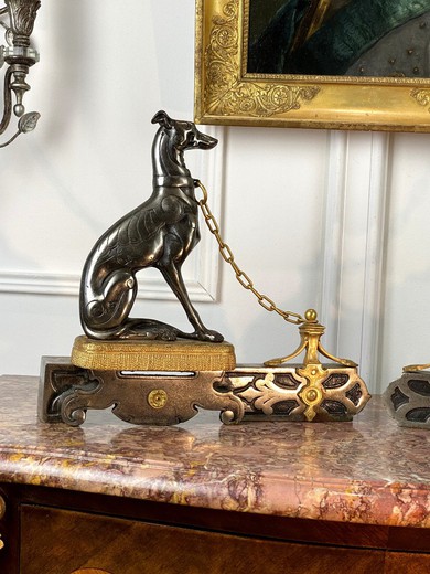 Antique fireplace andirons with greyhounds