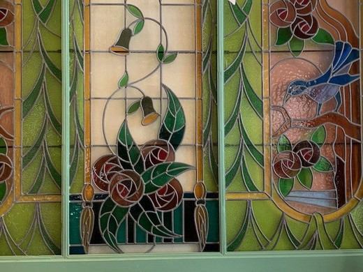 Antique art nouveau stained glass window