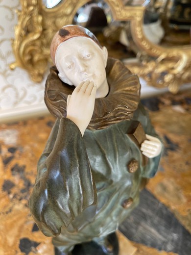Antique sculpture Pierrot with a mandoline