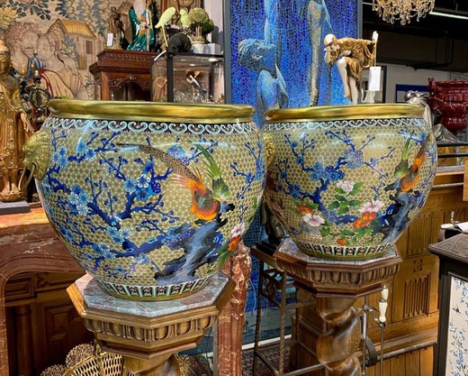 Antique pedestals with vases