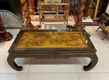 Antique carved table in oriental style