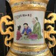 Large antique oriental vase on a pedestal.