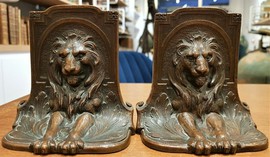 Antique book stands "Lions"