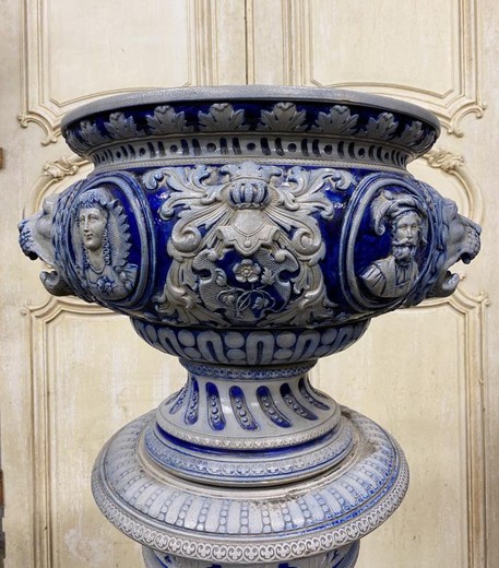 Antique flowerpot on a column