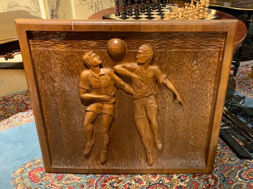 Set of three carved panels "Football match"