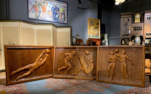 Set of three carved panels "Football match"