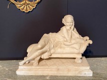 Young Woman In Marble Lying On A Couch Sculpture