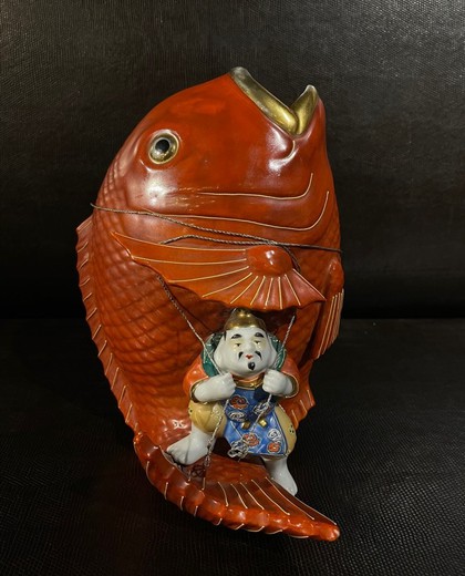 Antique sculpture "Ebisu and carp"