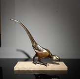 Antique pheasant sculpture