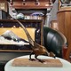 Antique pheasant sculpture