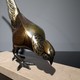 Antique pheasant sculpture
