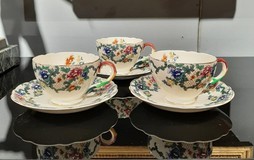 Antique cup and two dishes Antique cup and two dishes