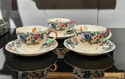 Antique cup and two dishes